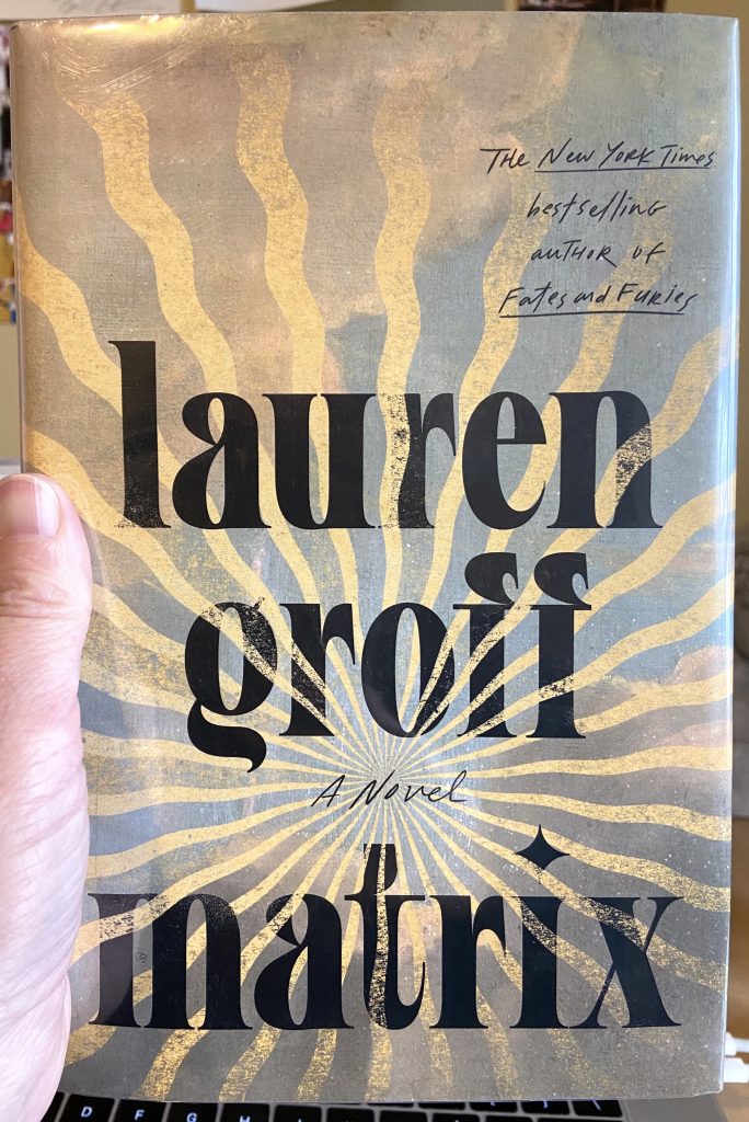 A copy of the book Matrix by Lauren Groff held up by a hand